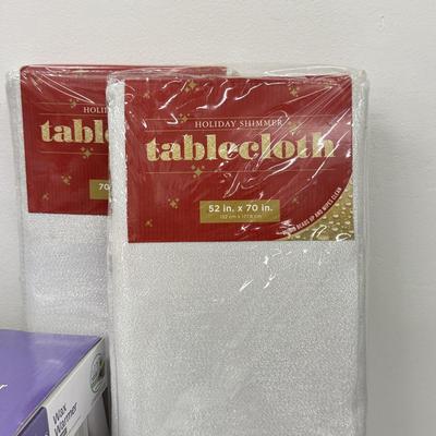 LOT 91: Elephant Wax Warmer, NIP Cloth Tablecloths & Floating Candle