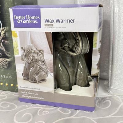 LOT 91: Elephant Wax Warmer, NIP Cloth Tablecloths & Floating Candle