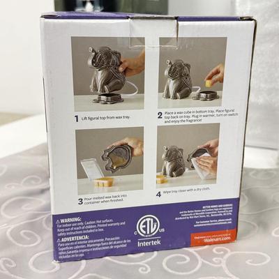 LOT 91: Elephant Wax Warmer, NIP Cloth Tablecloths & Floating Candle