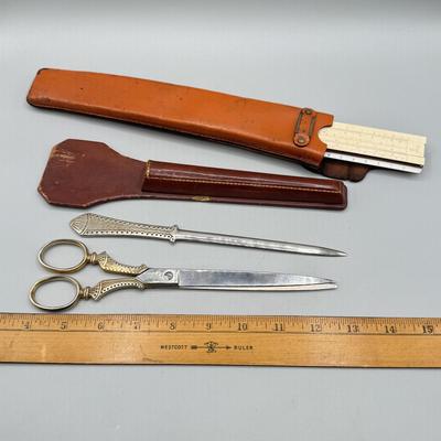 LOT 112: Vintage Griffon Scissors / Letter Opener Set in Lether case & Drafting Slide Ruler in Leather Case