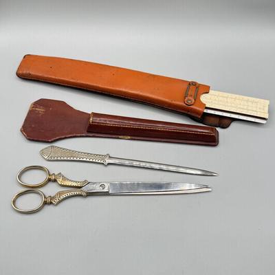 LOT 112: Vintage Griffon Scissors / Letter Opener Set in Lether case & Drafting Slide Ruler in Leather Case