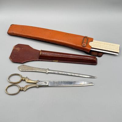 LOT 112: Vintage Griffon Scissors / Letter Opener Set in Lether case & Drafting Slide Ruler in Leather Case