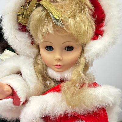 LOT 113: Hand made Motorized Doll Christmas Carolers