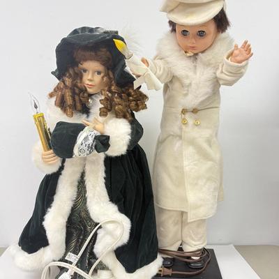 LOT 114: Vintage Animated Caroler in Green & Extra Tall Caroler