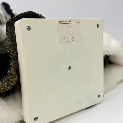 LOT 114: Vintage Animated Caroler in Green & Extra Tall Caroler