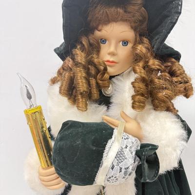 LOT 114: Vintage Animated Caroler in Green & Extra Tall Caroler