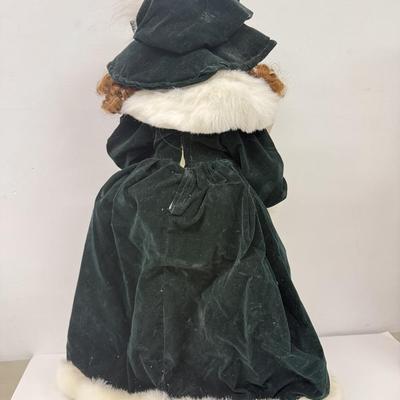 LOT 114: Vintage Animated Caroler in Green & Extra Tall Caroler