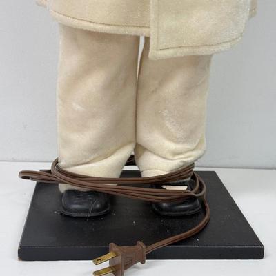 LOT 114: Vintage Animated Caroler in Green & Extra Tall Caroler