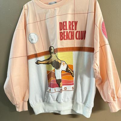 LOT 119: Size 52/XL Brett Favre Packers Jersey & 1980s Style Del Rey Beach Club Long Sleeve TShirt