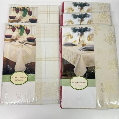 LOT 120: Five NIP Round 70” White Winter Plaid Table Cloths
