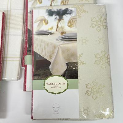 LOT 120: Five NIP Round 70” White Winter Plaid Table Cloths