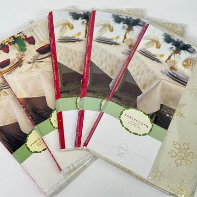 LOT 120: Five NIP Round 70” White Winter Plaid Table Cloths