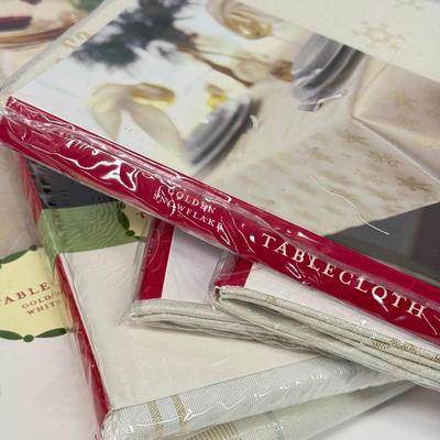 LOT 120: Five NIP Round 70” White Winter Plaid Table Cloths