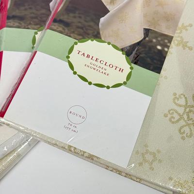 LOT 120: Five NIP Round 70” White Winter Plaid Table Cloths