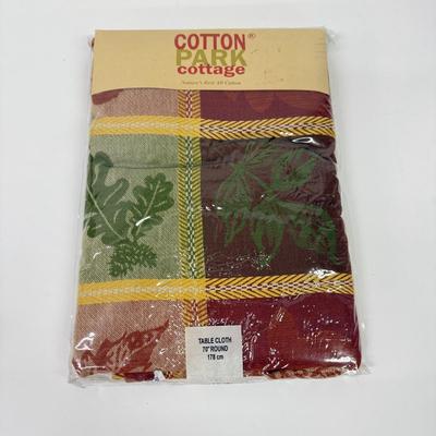 LOT 122: Four NIP Round Tablecloths