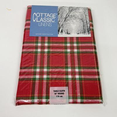 LOT 122: Four NIP Round Tablecloths