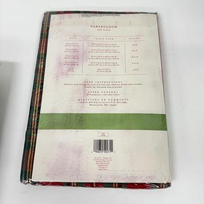 LOT 124: Four NIP Red Plaid Tablecloths