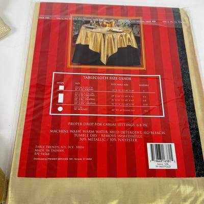 LOT 125: Gold Colored Tablecloths - some NIP