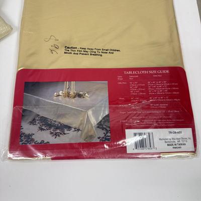 LOT 125: Gold Colored Tablecloths - some NIP