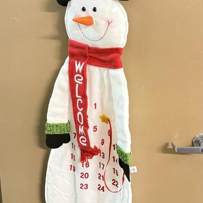 LOT 132: Snowman Christmas Calendar, Santa Tablecloths (NIP) & Hand Made Tree Wall Hanging
