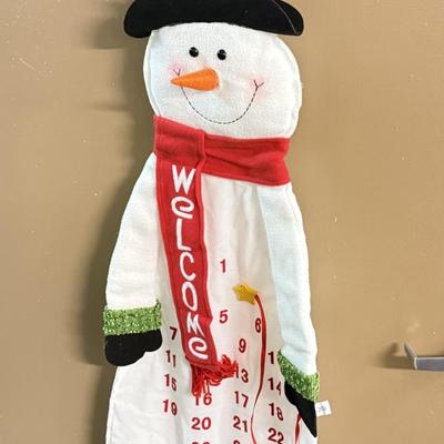 LOT 132: Snowman Christmas Calendar, Santa Tablecloths (NIP) & Hand Made Tree Wall Hanging