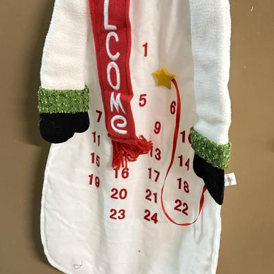 LOT 132: Snowman Christmas Calendar, Santa Tablecloths (NIP) & Hand Made Tree Wall Hanging
