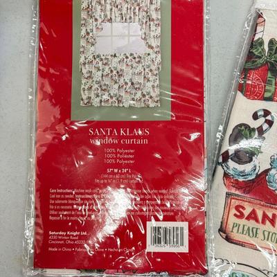 LOT 132: Snowman Christmas Calendar, Santa Tablecloths (NIP) & Hand Made Tree Wall Hanging