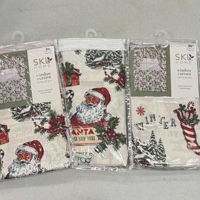 LOT 132: Snowman Christmas Calendar, Santa Tablecloths (NIP) & Hand Made Tree Wall Hanging