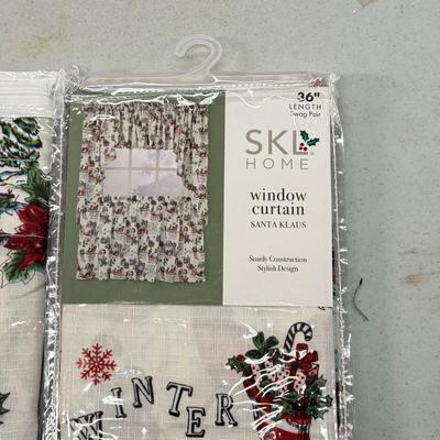 LOT 132: Snowman Christmas Calendar, Santa Tablecloths (NIP) & Hand Made Tree Wall Hanging