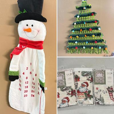 LOT 132: Snowman Christmas Calendar, Santa Tablecloths (NIP) & Hand Made Tree Wall Hanging