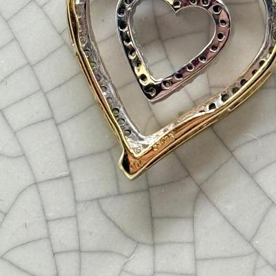 LOT 151: 10kt Gold Heart Pendant on 19" Chain (2.2gtw)