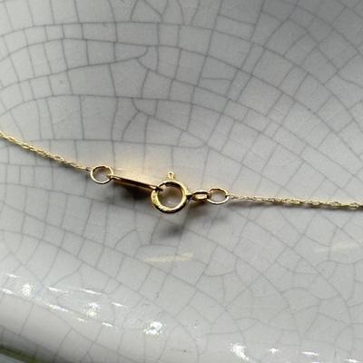 LOT 151: 10kt Gold Heart Pendant on 19" Chain (2.2gtw)