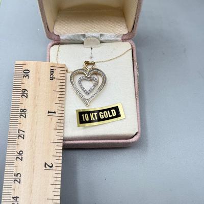 LOT 151: 10kt Gold Heart Pendant on 19" Chain (2.2gtw)