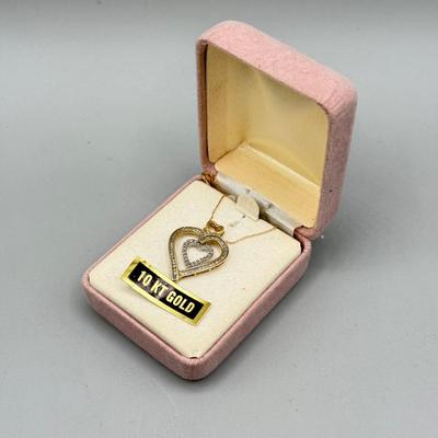 LOT 151: 10kt Gold Heart Pendant on 19" Chain (2.2gtw)