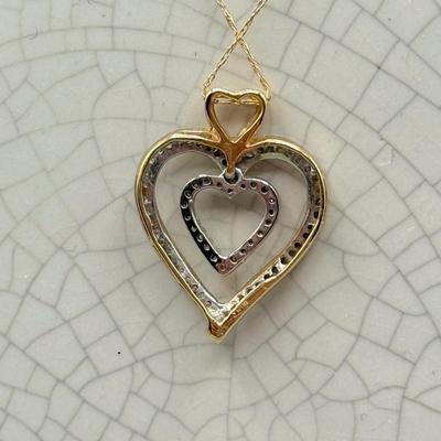 LOT 151: 10kt Gold Heart Pendant on 19" Chain (2.2gtw)