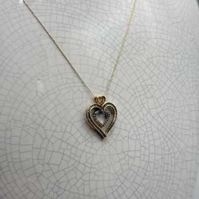 LOT 151: 10kt Gold Heart Pendant on 19" Chain (2.2gtw)