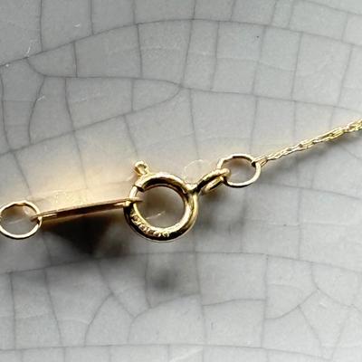 LOT 151: 10kt Gold Heart Pendant on 19" Chain (2.2gtw)