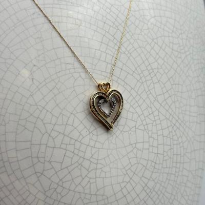 LOT 151: 10kt Gold Heart Pendant on 19" Chain (2.2gtw)