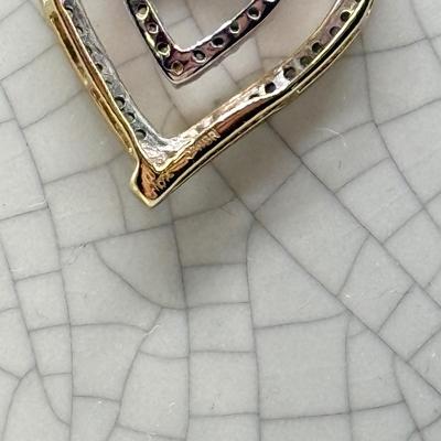 LOT 151: 10kt Gold Heart Pendant on 19" Chain (2.2gtw)