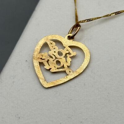 LOT 155: 10kt Gold "I LOVE YOU" Heart Pendant on 18' chain (1.8gtw)