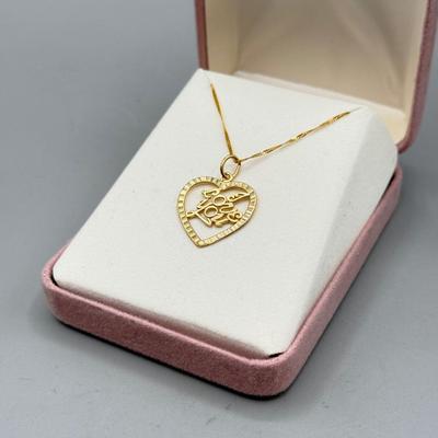 LOT 155: 10kt Gold "I LOVE YOU" Heart Pendant on 18' chain (1.8gtw)