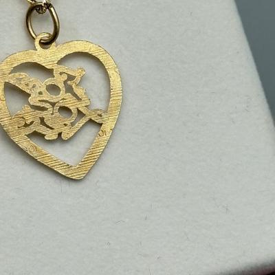 LOT 155: 10kt Gold "I LOVE YOU" Heart Pendant on 18' chain (1.8gtw)
