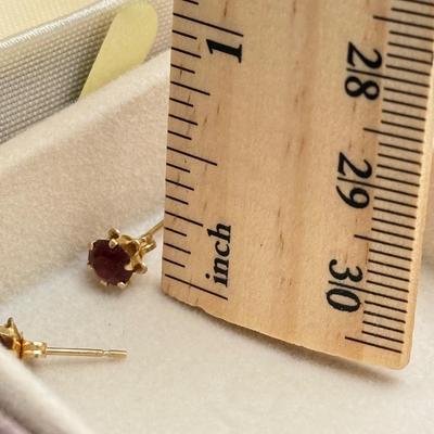 LOT 160: 14kt Gold: Garnet Earrings (0.4g) & Guardian Angel Pin (0.8g)