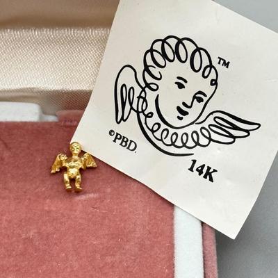 LOT 160: 14kt Gold: Garnet Earrings (0.4g) & Guardian Angel Pin (0.8g)