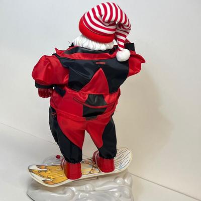 LOT 163: Vintage Gemmy Animated Snowboarding Santa Figure