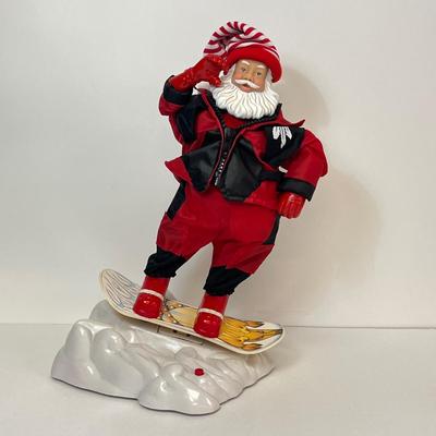 LOT 163: Vintage Gemmy Animated Snowboarding Santa Figure