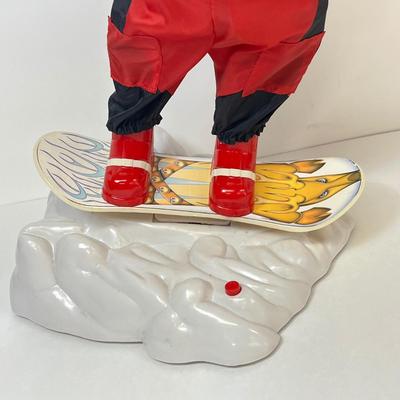 LOT 163: Vintage Gemmy Animated Snowboarding Santa Figure