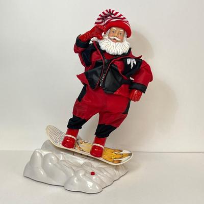 LOT 163: Vintage Gemmy Animated Snowboarding Santa Figure