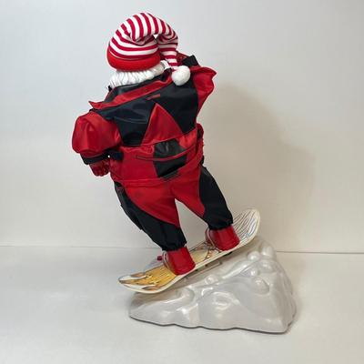 LOT 163: Vintage Gemmy Animated Snowboarding Santa Figure