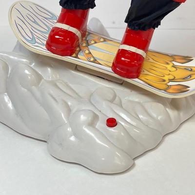 LOT 163: Vintage Gemmy Animated Snowboarding Santa Figure
